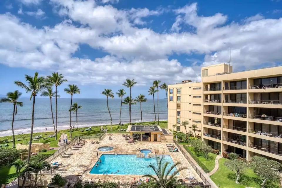 Picture taken from our lanai, facing the ocean, pool and grounds.