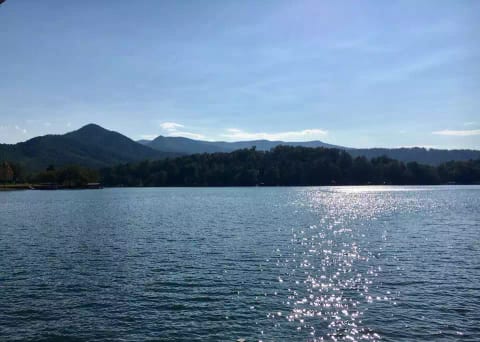 This picture is from our yard and is the sunset view. We have the whole point so you also get an uninterrupted sunrise view, too. Just two hours from Atlanta/Ashville/Chattanooga. You are near very close to town and the Ga Mountain Fairgrounds.