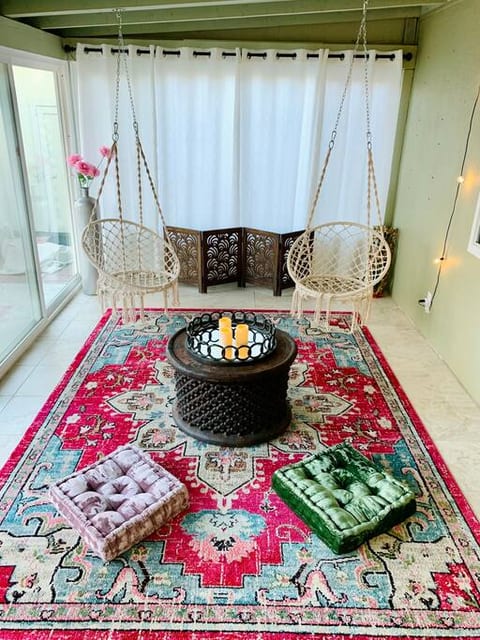 Meditation area with swings and velvet cushions, great for mornings :)
