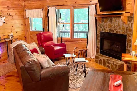 Cozy living room with easy-to-use fireplace.