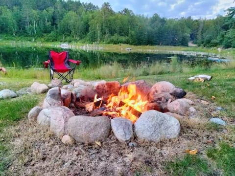Enjoy a campfire lakeside