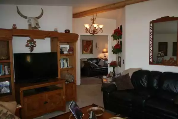 Beautiful southwest Living Room with 42" Smart TV, Netflix, Roku Preium Plus, 300 top DVD's and books for your enjoyment. CD player and music in Den with leather couch and 3 reading lamps. - $695WK Amazing 25AC Birding Ranch Vacation Rental  - Pearce