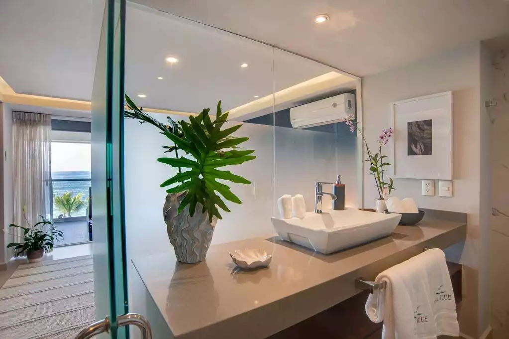 Enjoy viewing the ocean even while getting ready in the master bath.