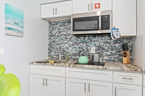 This is the kitchen. The countertops have a "leather" finish.