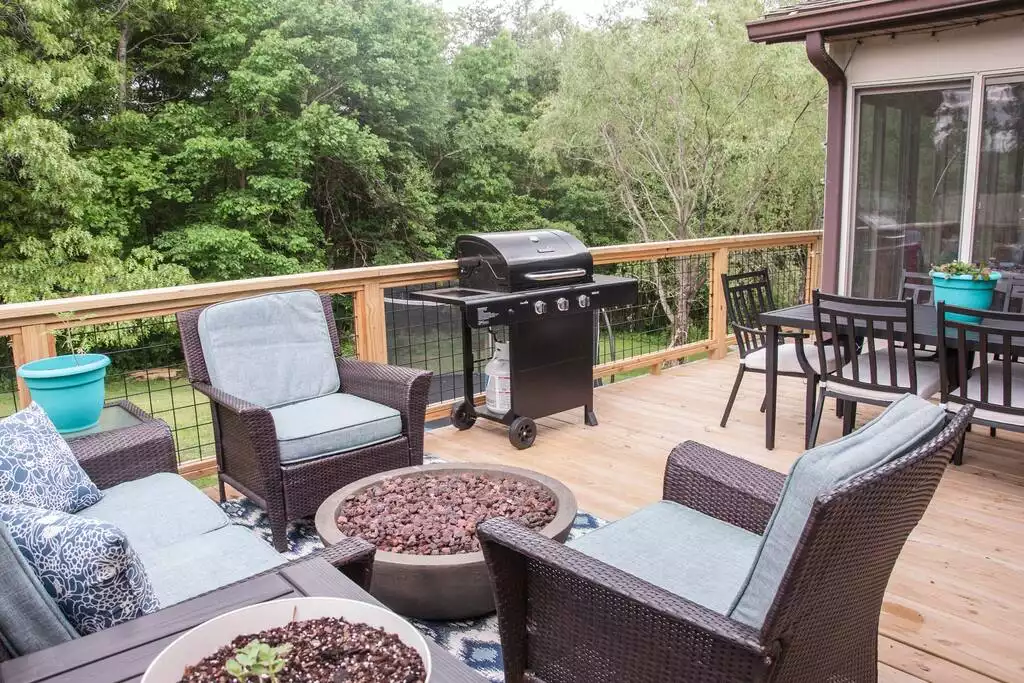 Spacious deck with dining table for 6, fire pit, and couch/chairs - Kids play while adults relax!  Kids Treehouse! - Woodfin