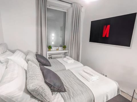 A perfect spot to relax? You'll love watching a movie on the big Smart TV and falling asleep in full satin bedding.
