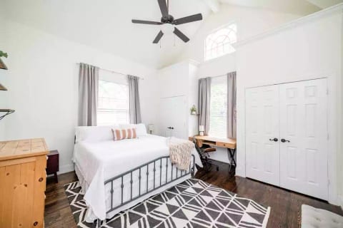 Master suite with 25 foot cathedral ceilings and his/hers closet. Very comfortable king bed!