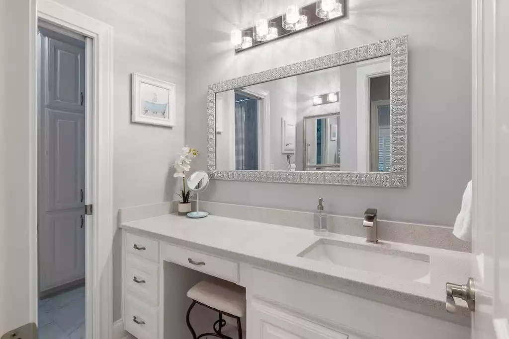 Bathroom #5 with dual vanity and built-in makeup station. Bathroom #5 with dual vanity and built-in makeup station. - Main House at Whispering Oaks Estate - Dripping Springs