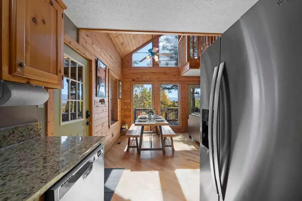 View from the kitchen, to dining, to the Smokies! View from the kitchen, to dining, to the Smokies! - Closer to Heaven Cabin - Sevierville