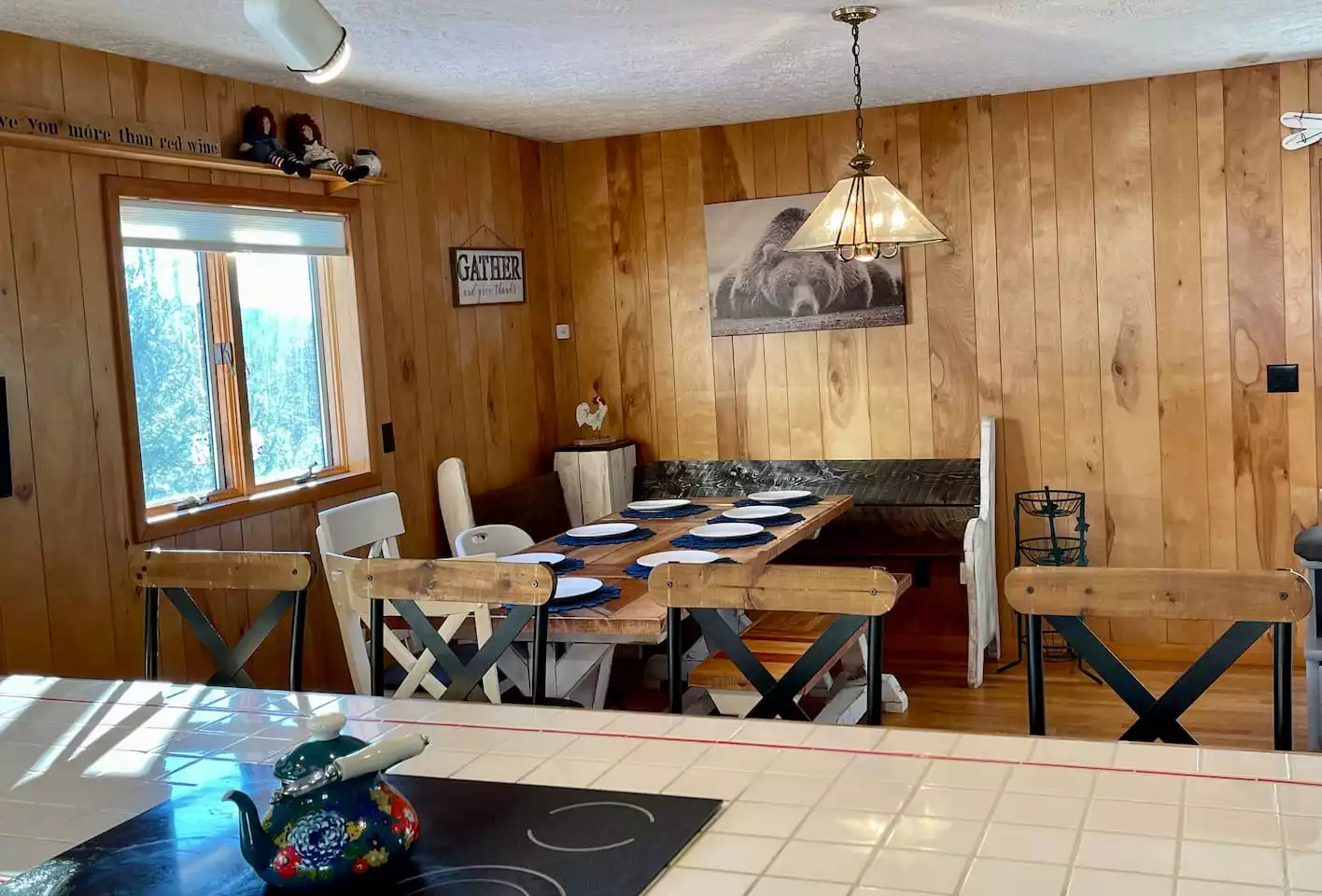 As you prepare dinner, you can overlook the dining room area. We have stocked the cupboard with spices and other essentials (including several cook books!),  placed a CrockPot in the cabinet for your use, and ensured that you have enough serviceware - The Lodges at Buffalo Mountain - Floyd