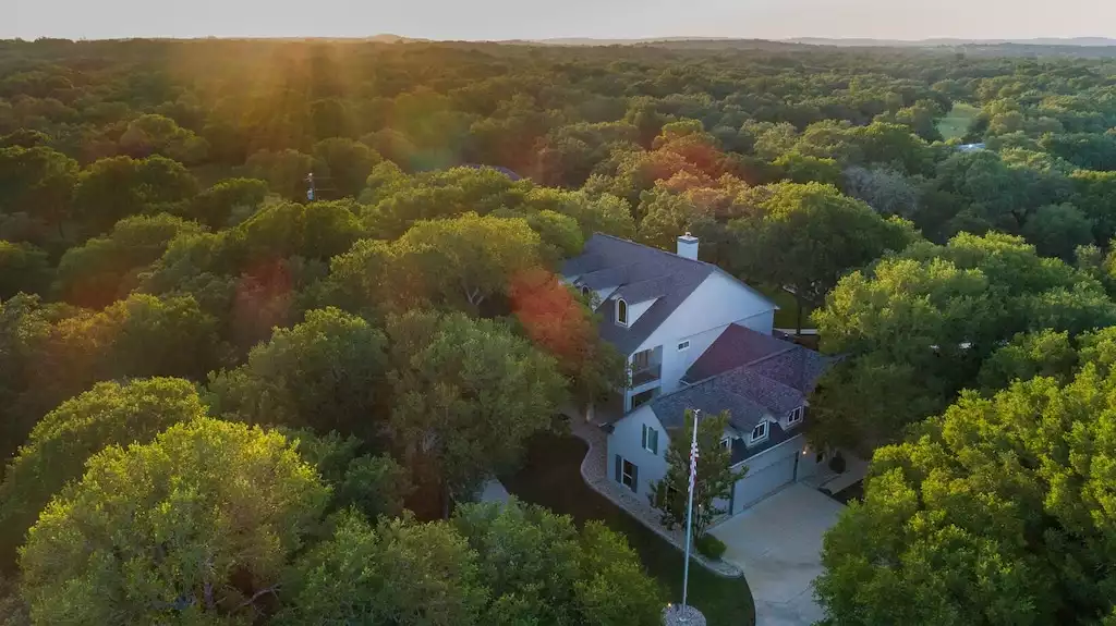 The Estate is tucked away in the trees on over 50 acres of Texas Hill Country. The Estate is tucked away in the trees on over 50 acres of Texas Hill Country. - Main House at Whispering Oaks Estate - Dripping Springs