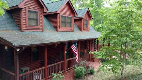 The front entrance to Laurelwood Lodge. Come sit a spell on the cozy porch and watch the local wildlife.