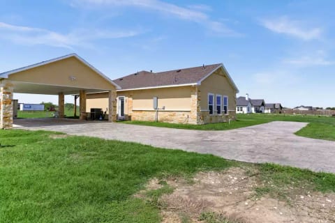 Carport parks up to four vehicles or suitable for shade to host your outdoor events.