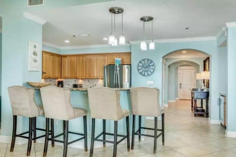 Open kitchen for entertaining with beach view