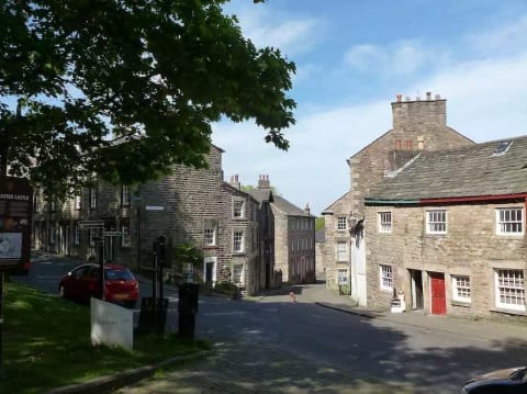 View down our street with the castle behind you...our place is where the high windows are on the left.