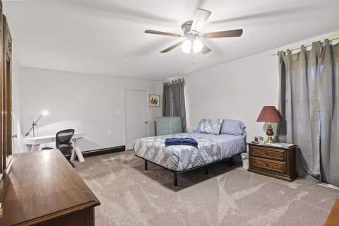 the Desk is in the master bedroom, along with a TV and 2 dressers