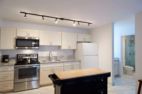 Sleek kitchen remodel. Granite, porcelain, new everything!