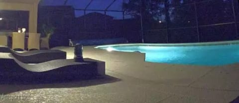 Pool at night Vacation Rental Villa House of Orange at Watersong Resort