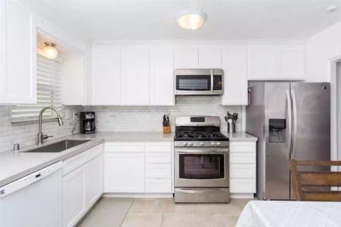 Kitchen with Dishwasher and Laundry Washer/Dryer in unit (*Note: Coffee maker in photo has been replaced with K-Cup machine)