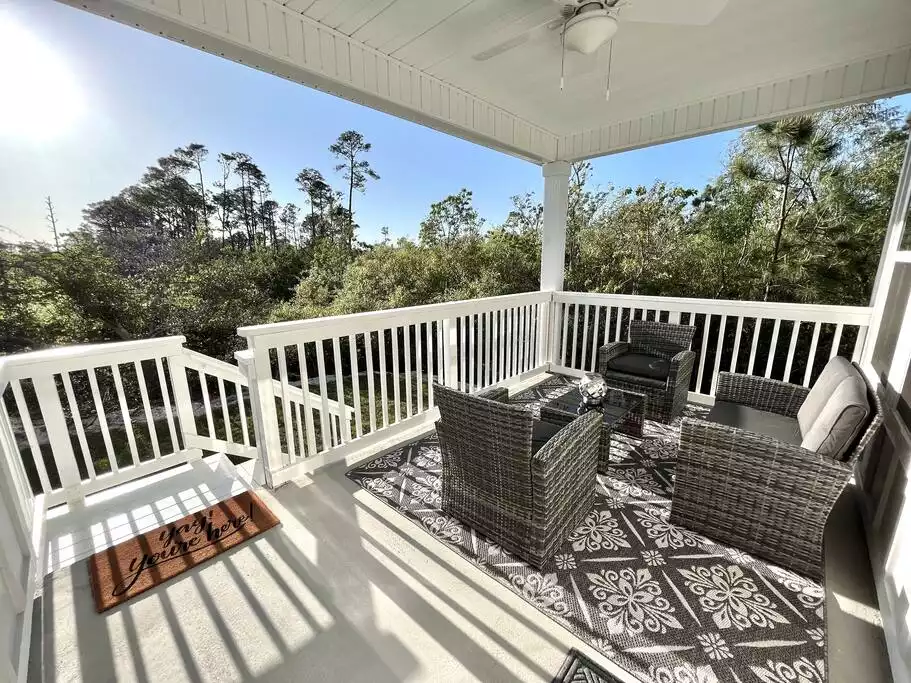 Feel the Florida breeze while relaxing on the well equipped back porch deck!! Feel the Florida breeze while relaxing on the well equipped back porch deck!! - Perdido Retreat - Modern Luxury near Beaches! - Perdido Key