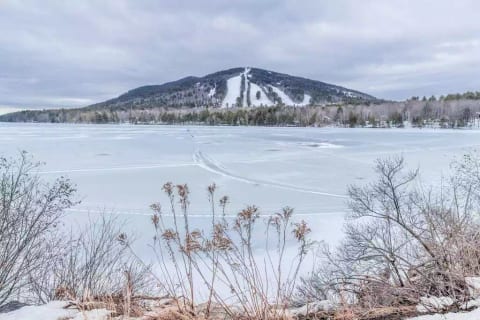 Pleasant Mountain/Shawnee Peak and Moose Pond (view from association beach)