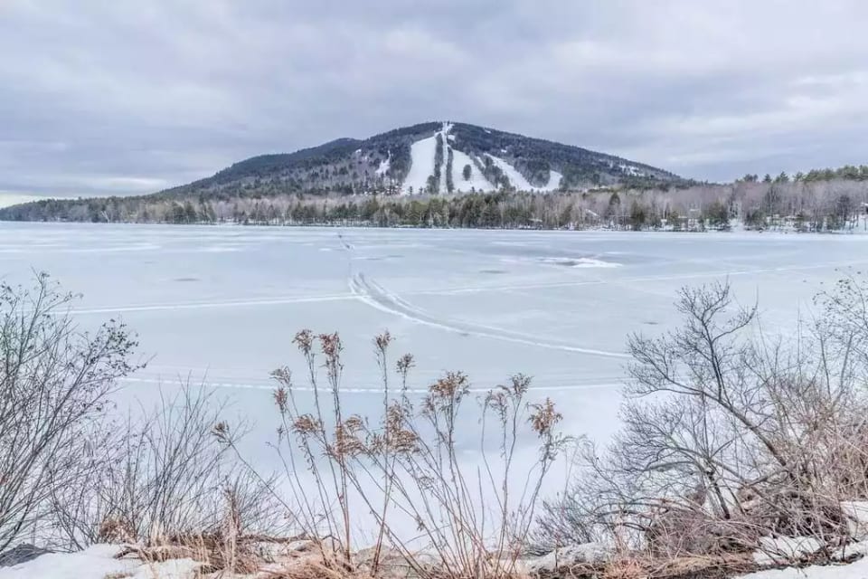 Pleasant Mountain/Shawnee Peak and Moose Pond (view from association beach)