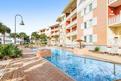 Gorgeous, zero-entry community pool and hot tub, which sits on the bank of the canal.