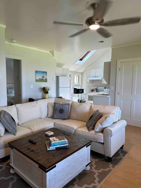 Living room with spectacular views of Ocean Park and the beach beyond.