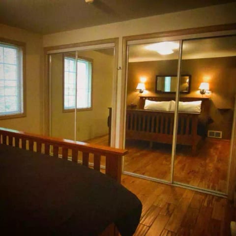 Another view of the Master Bedroom. We love how the mirrors open up the space!