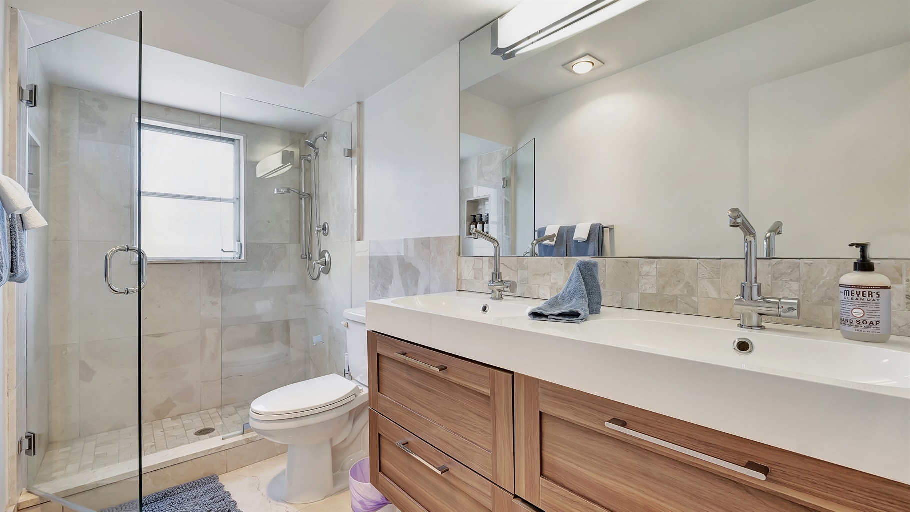 Your bathroom with natural light streaming in - Starfruit Beach House - Heated Pool Near Beach - Naples