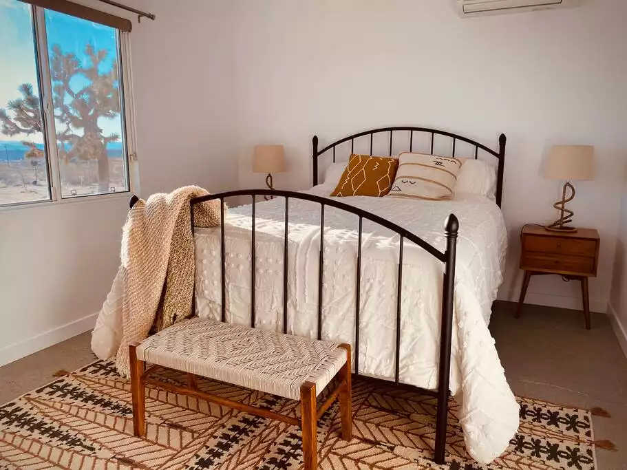 Bedroom 1 has a pillow top queen bed with memory foam pillows. - The Filmmakers House - Joshua Tree