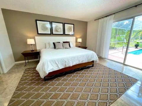 Master bedroom leads out to pool area. Private entrance.
