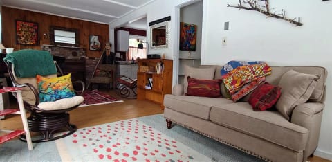 Loveseat in living area.