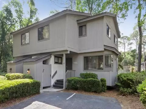 Small density complex with 2 assigned parking spots right across from beach!