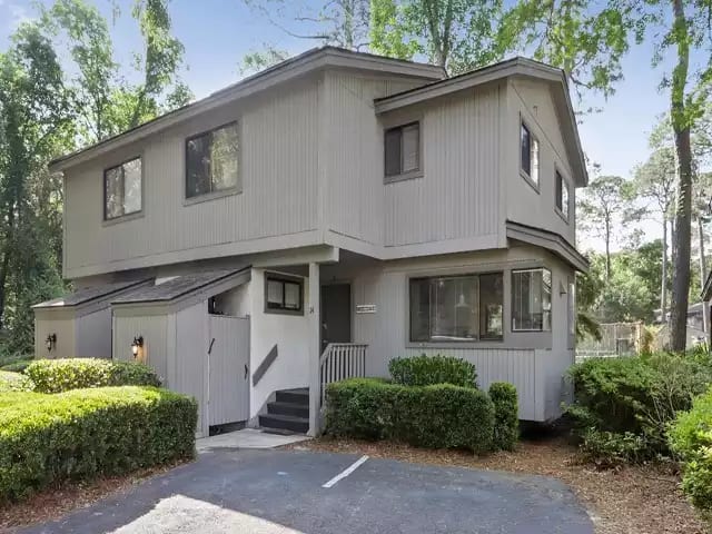Small density complex with 2 assigned parking spots right across from beach!