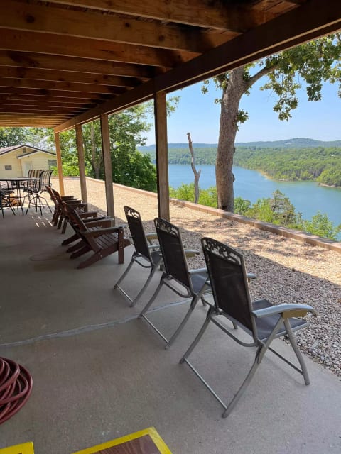 Ground level patio overlooking water