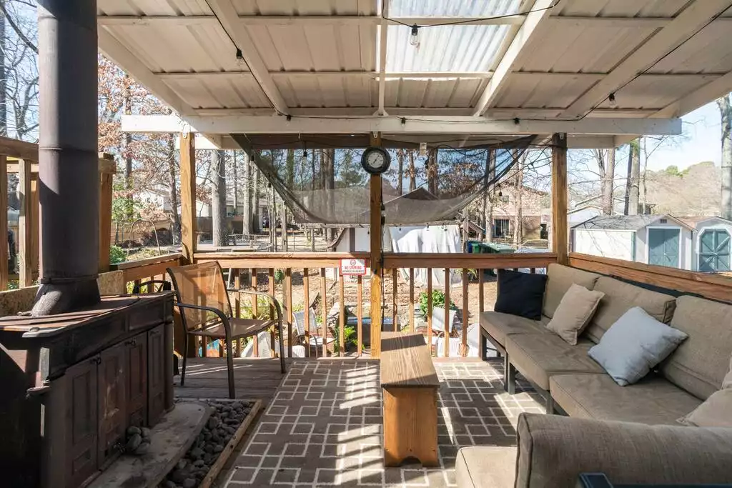 Covered deck patio - Cheerful Family-Friendly Home: Ample Outdoor Space - Raleigh