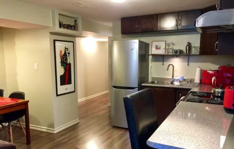 breakfast bar and dining nook in open concept fully outfitted kitchen