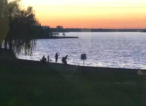 Fishing just steps away from the house. We have a few fishing poles or bring our own. We also have folding lawn chairs/drink cooler to take lakeside.