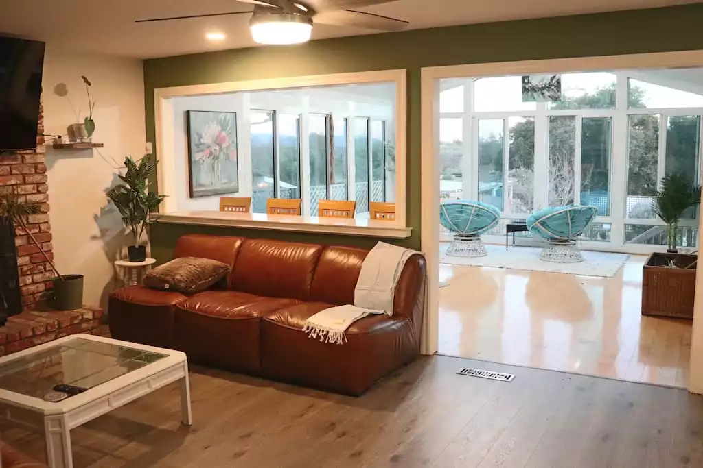 Living room & Indoor Patio full of natural light and a view.