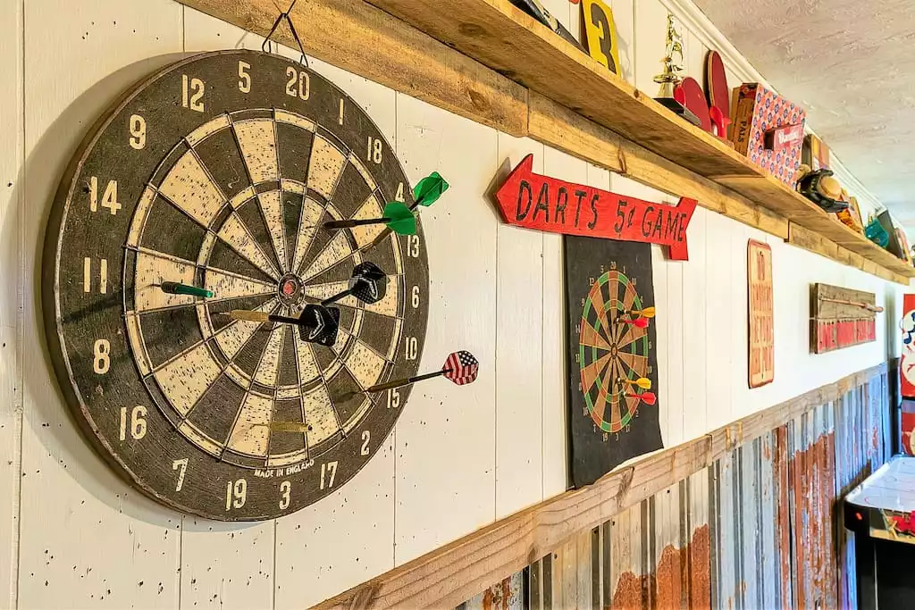 Try a healthy competition, while testing your skill at darts in the game room. Try a healthy competition, while testing your skill at darts in the game room. - Vintage Mountain Villa - Tiger