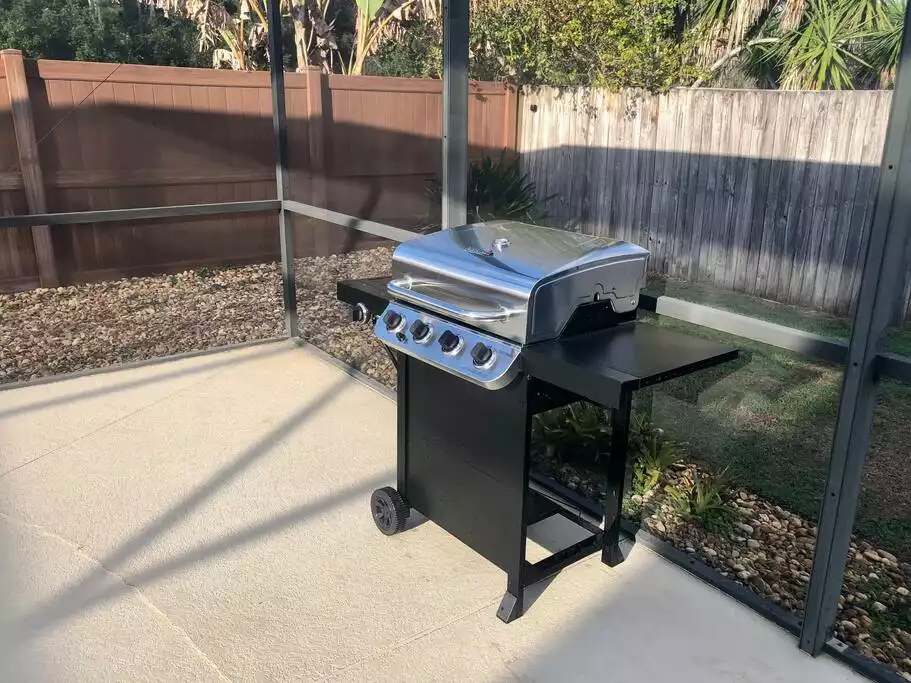 Spend some time outside and enjoy our included grill Spend some time outside and enjoy our included grill - Disney Area Boho Chic Villa - Kissimmee