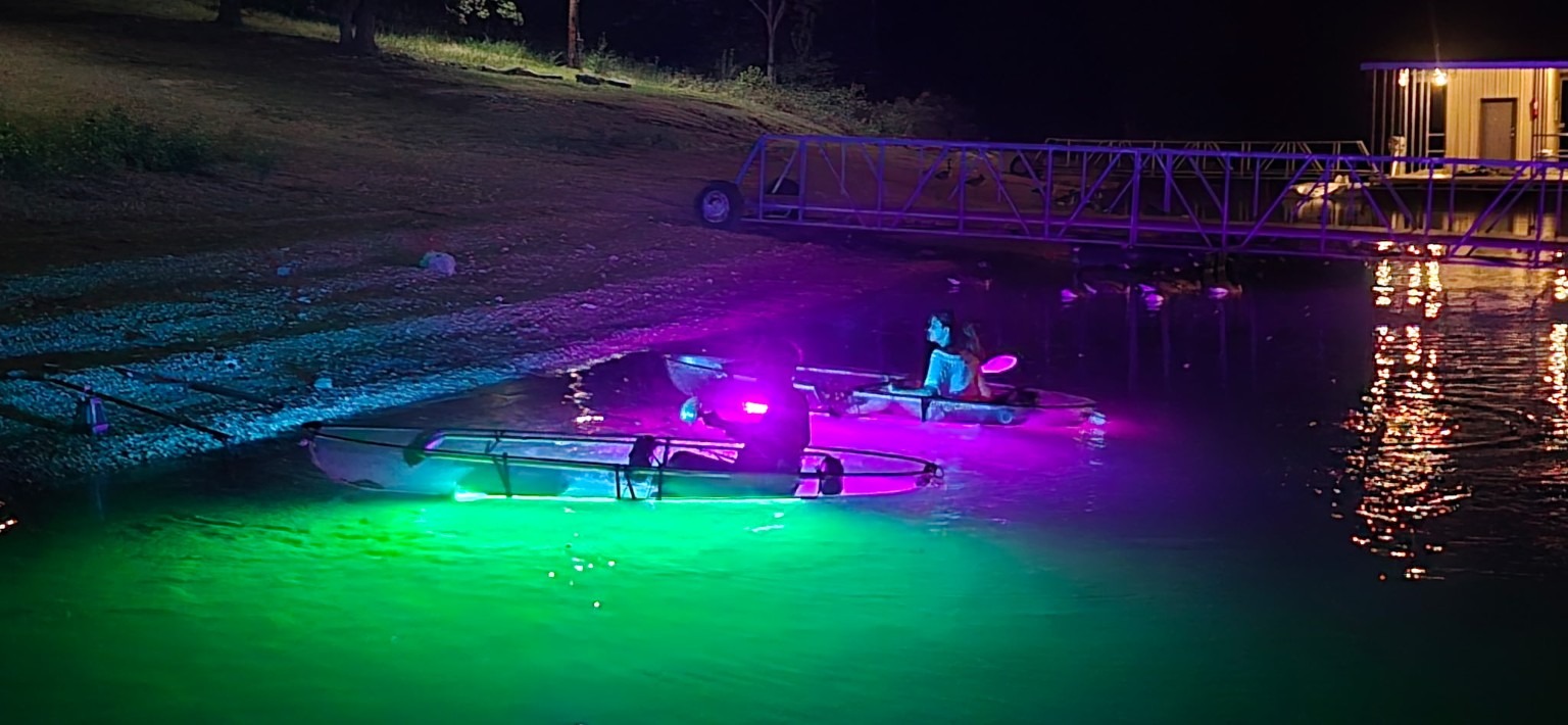 GloRides clear kayaks glowing on Table Rock Lake at night
