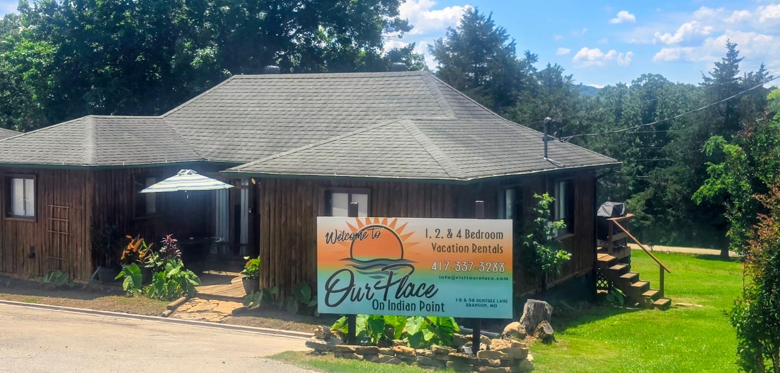 Our Place on Indian Point vacation rental building and sign